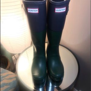 Hunter rain/winter boots. Green with blue trim, and have been slightly worn.